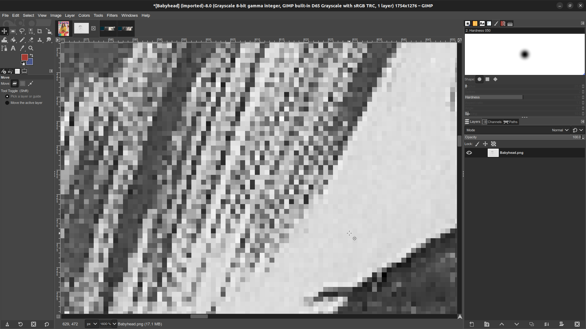 GIMP window, zoomed in close on the Babyhead monster's hair. After transitioning to greyscale the pixels display a spectrum of greys.
